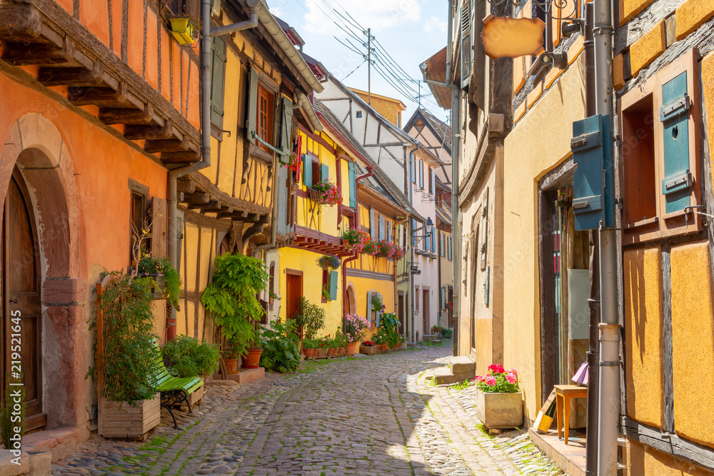narrow street in Eguisheim, Alsace, France