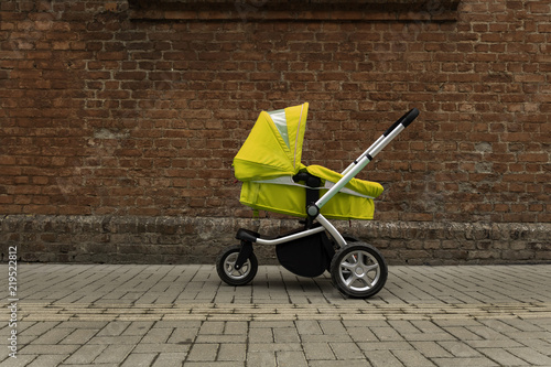 a yellow baby stroller stands on the road beside the wall