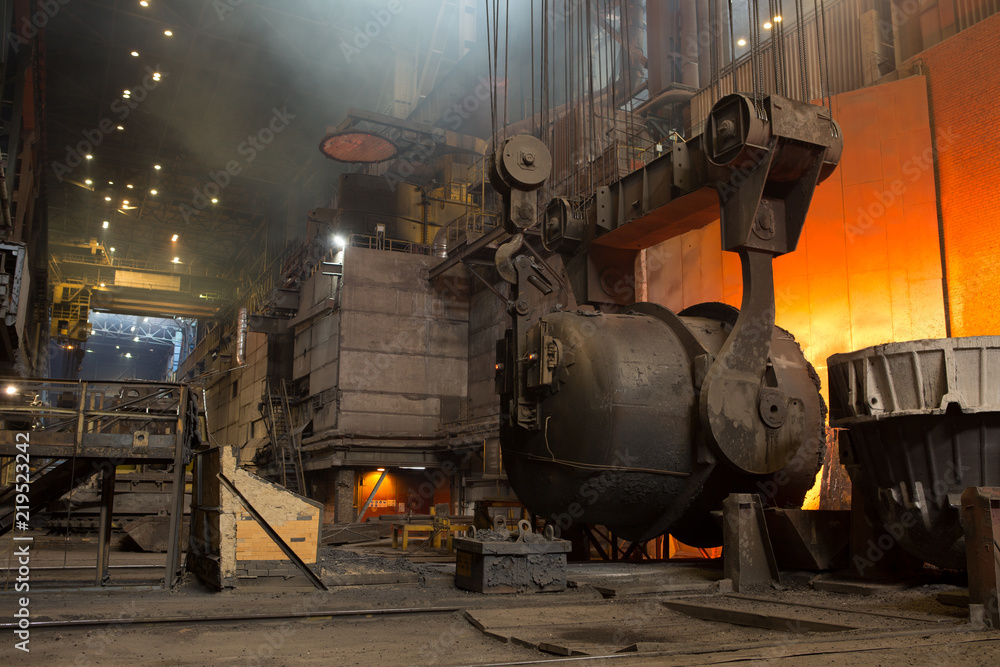 Fototapeta premium metal casting process with high temperature fire in metal part factory