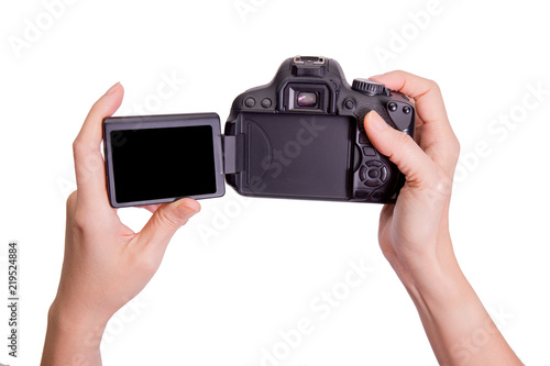 Hands holding the vari angle lcd dslr camera on white background,include clipping path