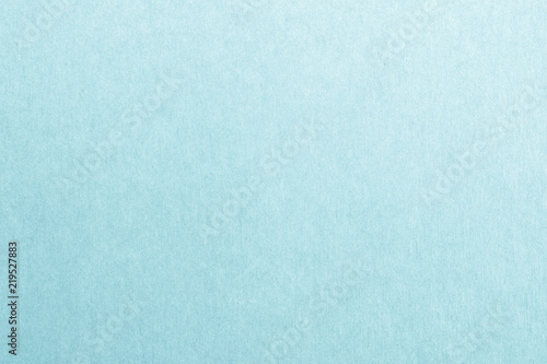 Recycled paper texture background in light blue color tone.