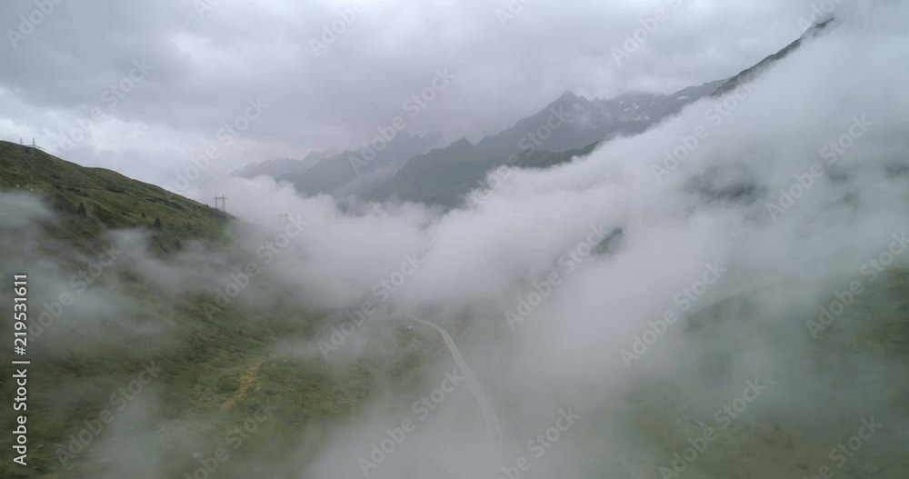 Cars on cloudy mountain road - Aerial 4K Cars on cloudy mountain road - Aerial 4K