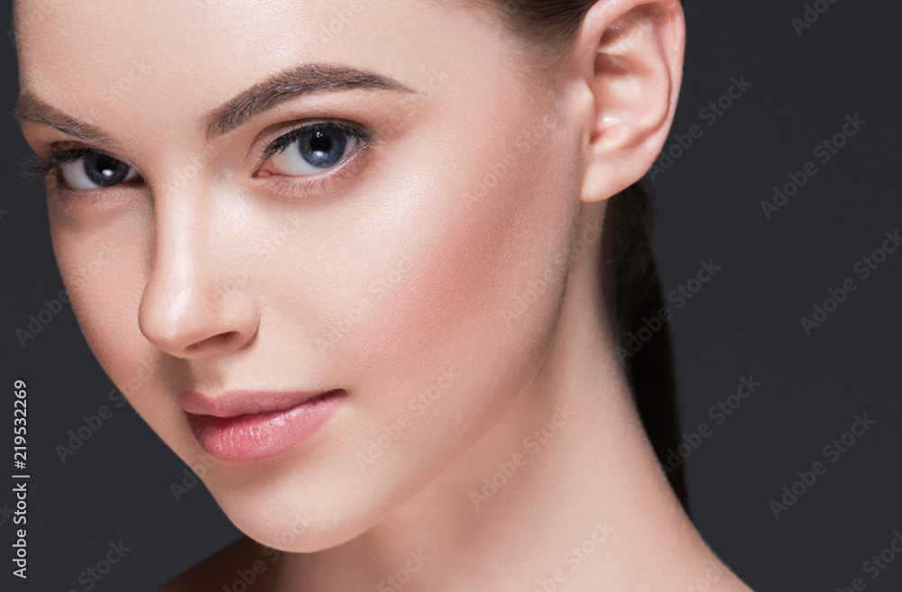 Beautiful Woman Face Portrait with hands. Beauty Skin Care Concept. Fashion Beauty Model isolated on white Beautiful Woman Face Portrait with hands. Beauty Skin Care Concept. Fashion Beauty Model isolated on white