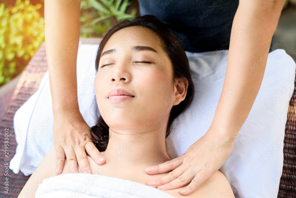 Sholder massage with young Asian woman Sholder massage with young Asian woman