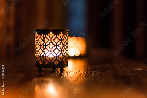 Soft candle light in a glass for decoration on the holidays 