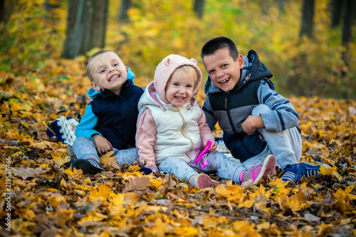children in the autumn forest © vovan