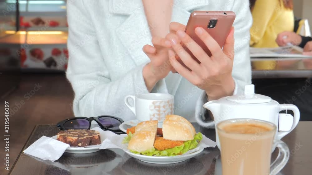 Woman taking photo of tasty breakfast on smartphone Woman taking photo of tasty breakfast on smartphone
