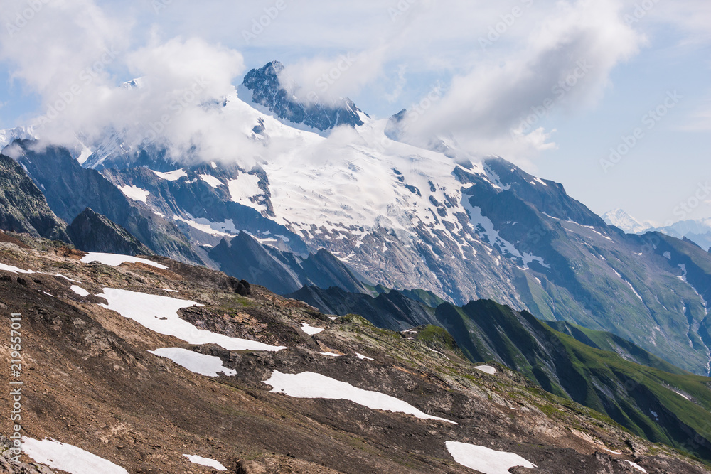 Mont-Blanc Snowy Mountain and Rocky Landscape on a Sunny Day. Mont-Blanc Snowy Mountain and Rocky Landscape on a Sunny Day.