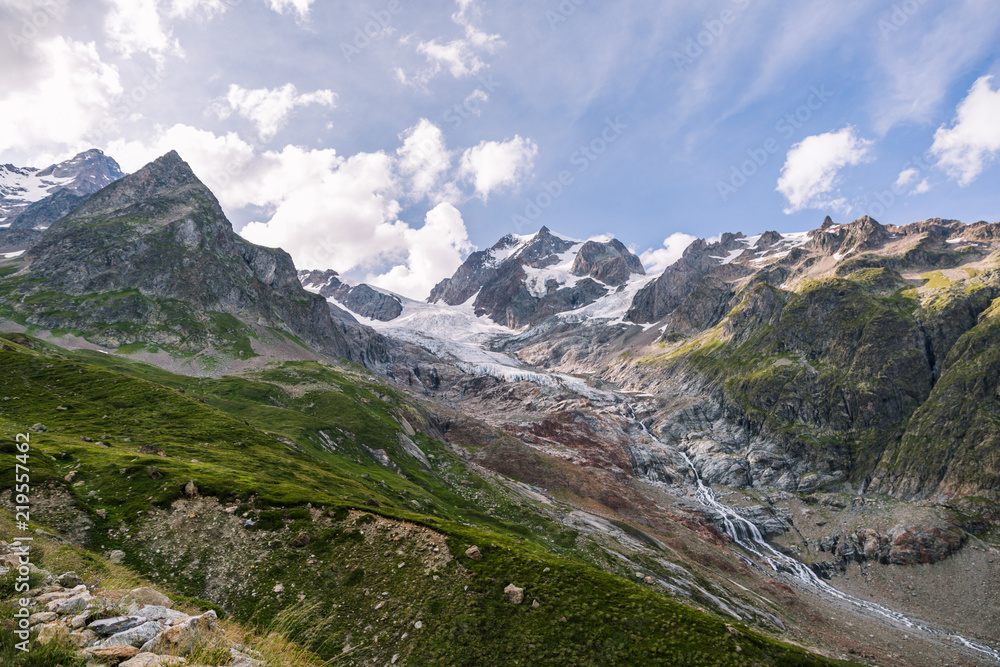 Glacier Snow Melting into a Stream in Iconic Mont-Blanc Mountain Range.