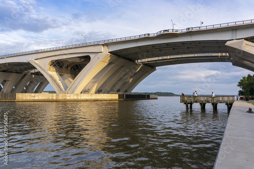 Below the Woodrow Wilson Memorial Bridge, which spans the Potomac River between Alexandria, Virginia, and the state of Maryland, as seen from Jones Point Park in Alexandria. photo