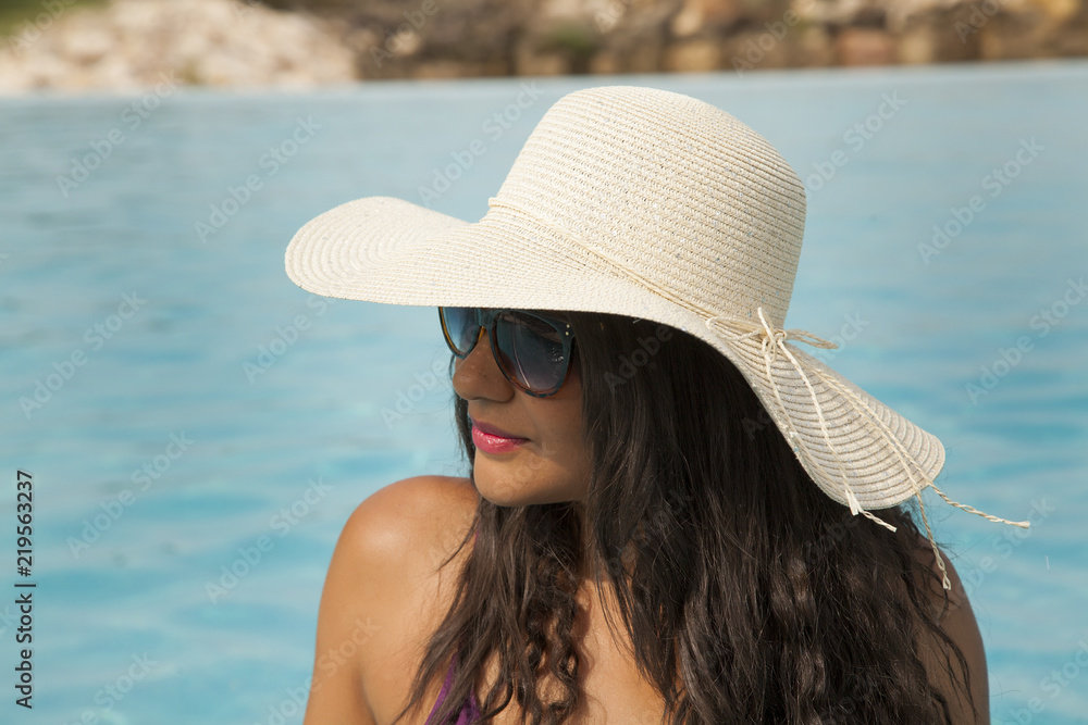 Beautiful woman enjoying the pool