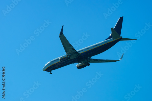 Plane flight in blue sky