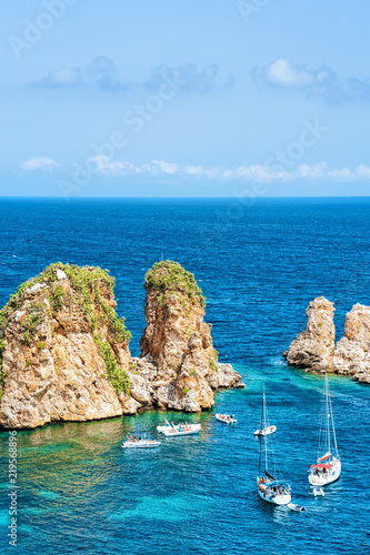 Fototapeta Naklejka Na Ścianę i Meble -  Ships in Mediterranean sea in Scopello Sicily Italy
