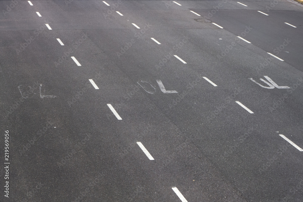 The lights of passing cars in a big avenue. The lights of passing cars in a big avenue.