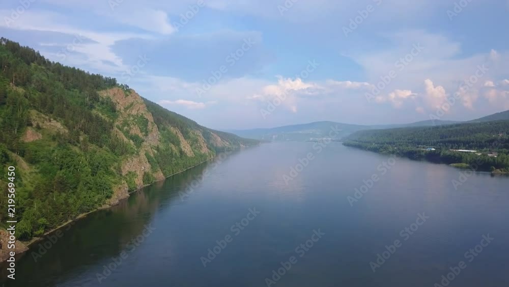 Beautiful drone shot of the Yenisei river with a cloudy sky Beautiful drone shot of the Yenisei river with a cloudy sky