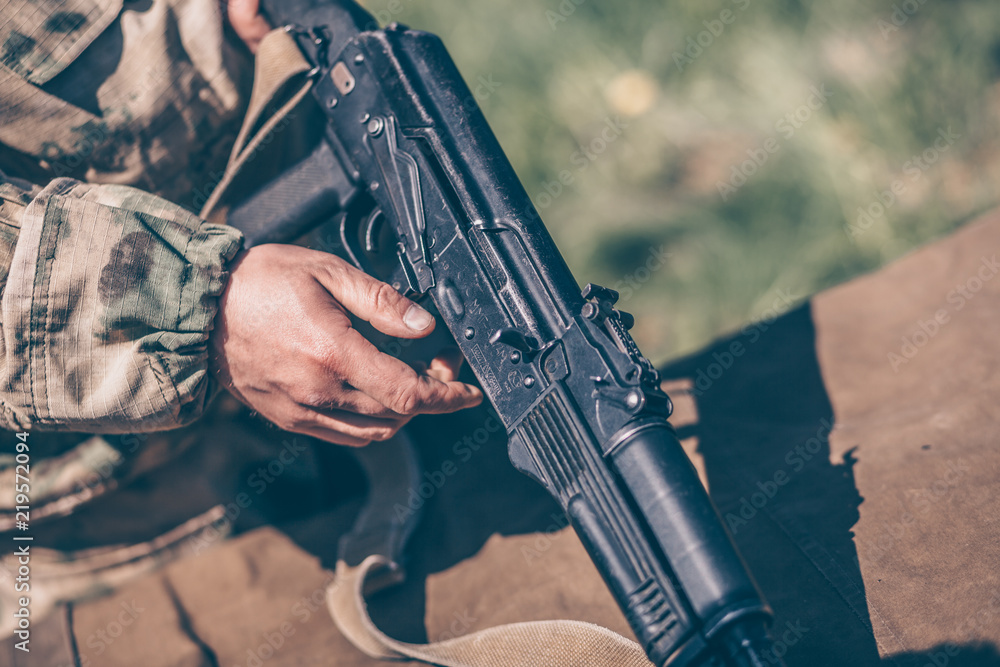 The instructor shows how to disassemble the AK47 Kalashnikov Stock Photo Adobe Stock