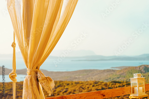 Fototapeta Naklejka Na Ścianę i Meble -  Idyllic sunrise in cafe in in Sardinia Italy