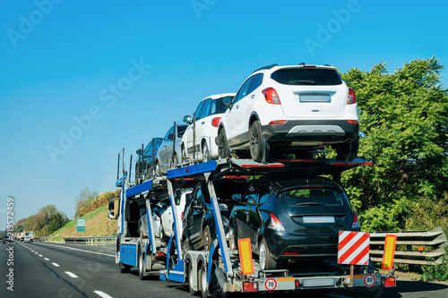 New car carrier on road