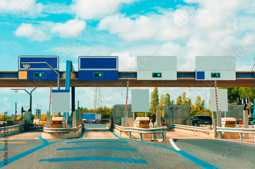 Toll booth with Blank traffic sign in road in Italy photo