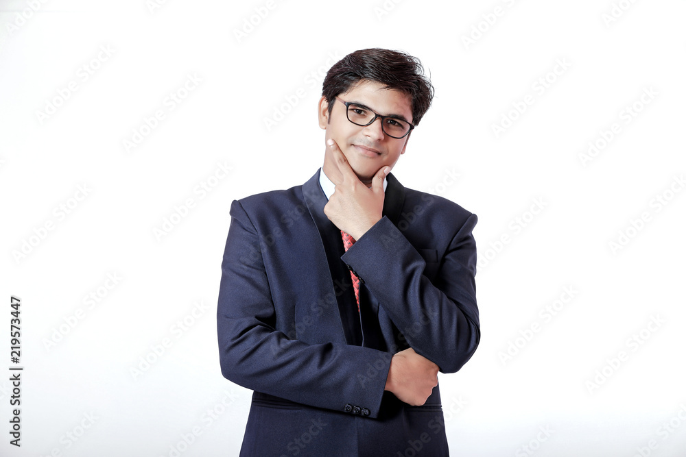 Young Indian businessman over white background Young Indian businessman over white background