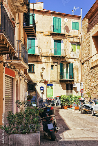 Scooter at the street of Monreale town Sicily Europe