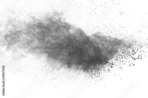 Black powder explosion against white background.