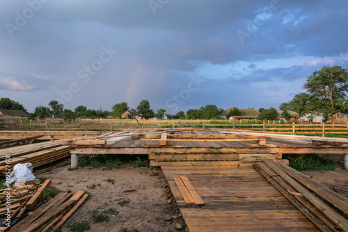 Construction of a wooden frame house with a triangular type A