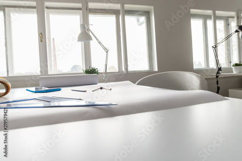 Architect working desk with sheet of paper