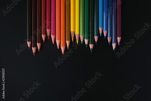color pencils on black background close up
