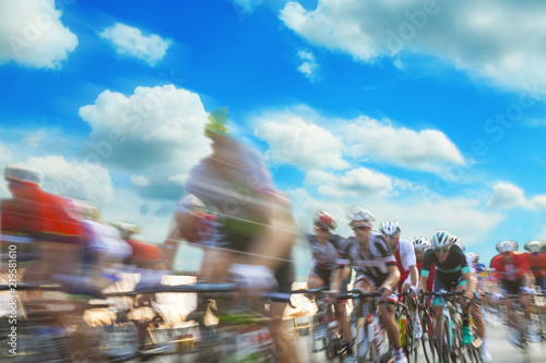 Group of cyclist during a race, motion blur photo