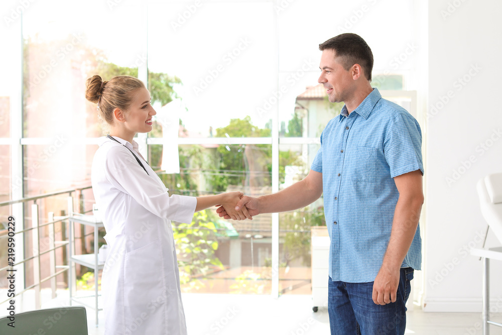 Fototapeta premium Patient having appointment with doctor in hospital