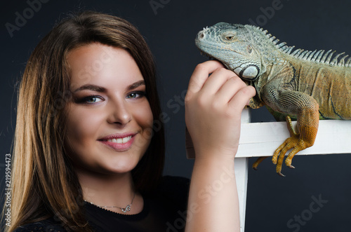 perfect size plus girl and green iguana
