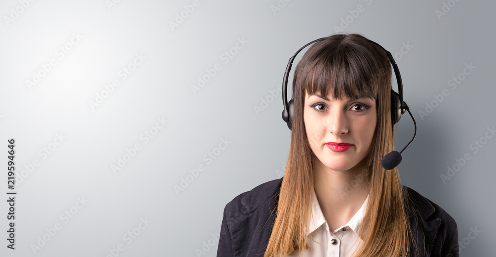 Young female telemarketer on a white background