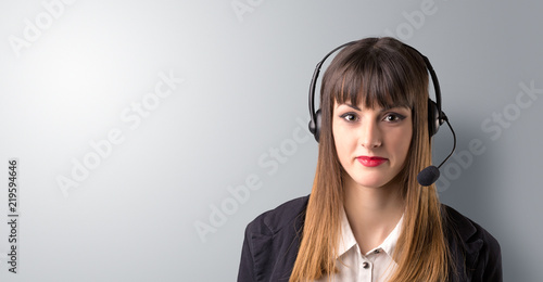 Young female telemarketer on a white background