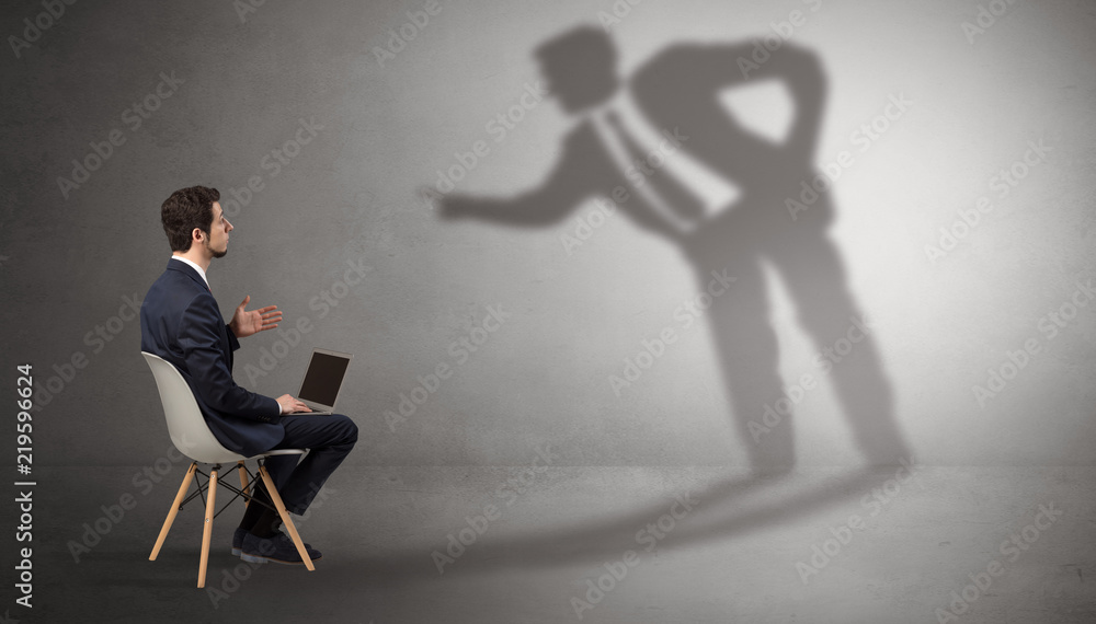 Businessman staying and offering stuffs to a shadow businessman
Businessman staying and offering stuffs to a shadow businessman