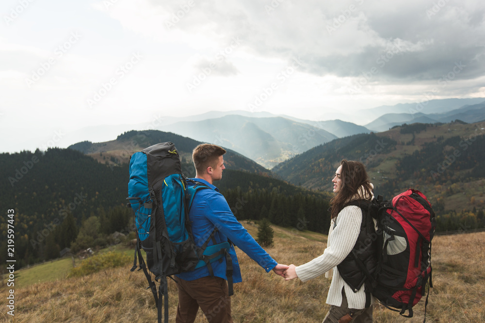 Fototapeta premium Couple in the mountains tourist