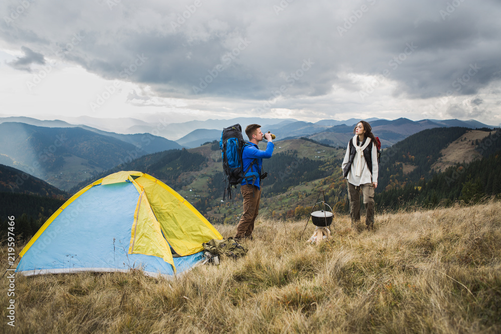 Fototapeta premium Couple in the mountains tourist
