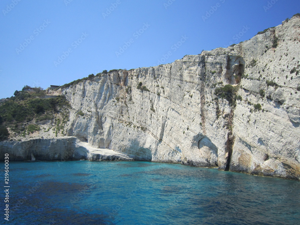 blue sea cliff cave