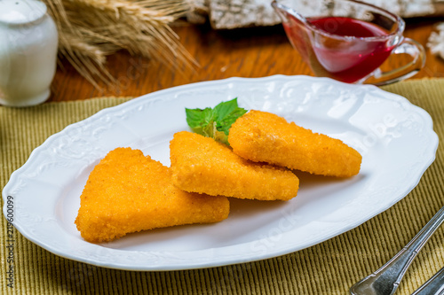 deep fried cheese with berry sauce