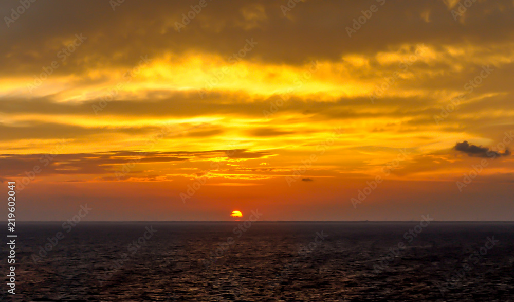 sun setting over the Caribbean Sea