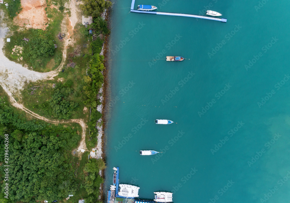 Travel boats in the tropical sea Aerial view drone shot,beautiful image for summer and travel background.