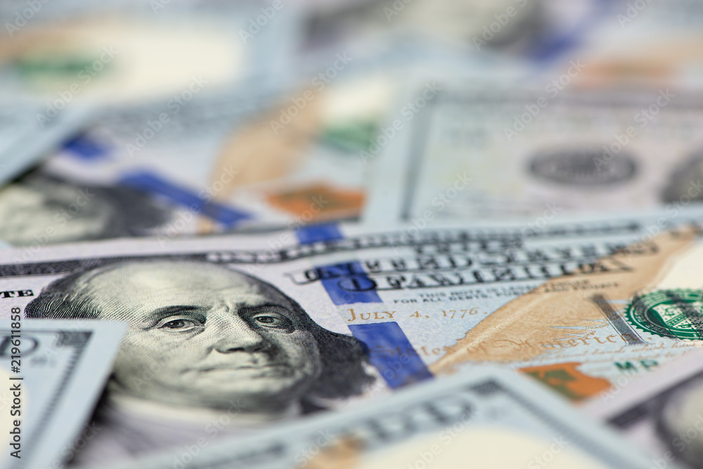 US dollar close up. Macro shot of a 100 dollar. US dollar close up. Macro shot of a 100 dollar.
