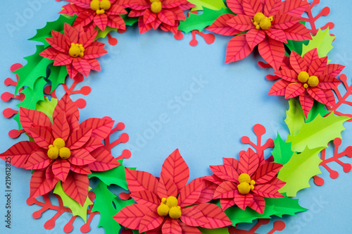 Christmas wreath of paper flowers poinsettia