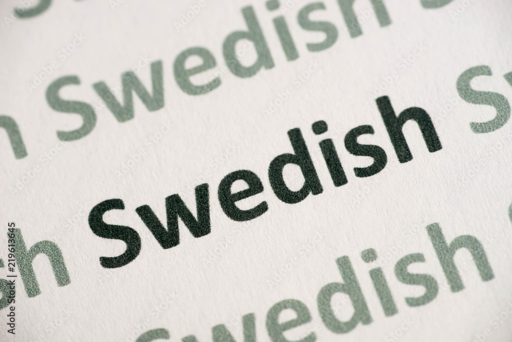 word Swedish language printed on paper macro word Swedish language printed on paper macro