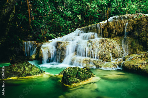 Beautiful waterfall in the rain forest jungle of thailand. Erawan waterfall in Erawan National Park, kanchanaburi,Thailand