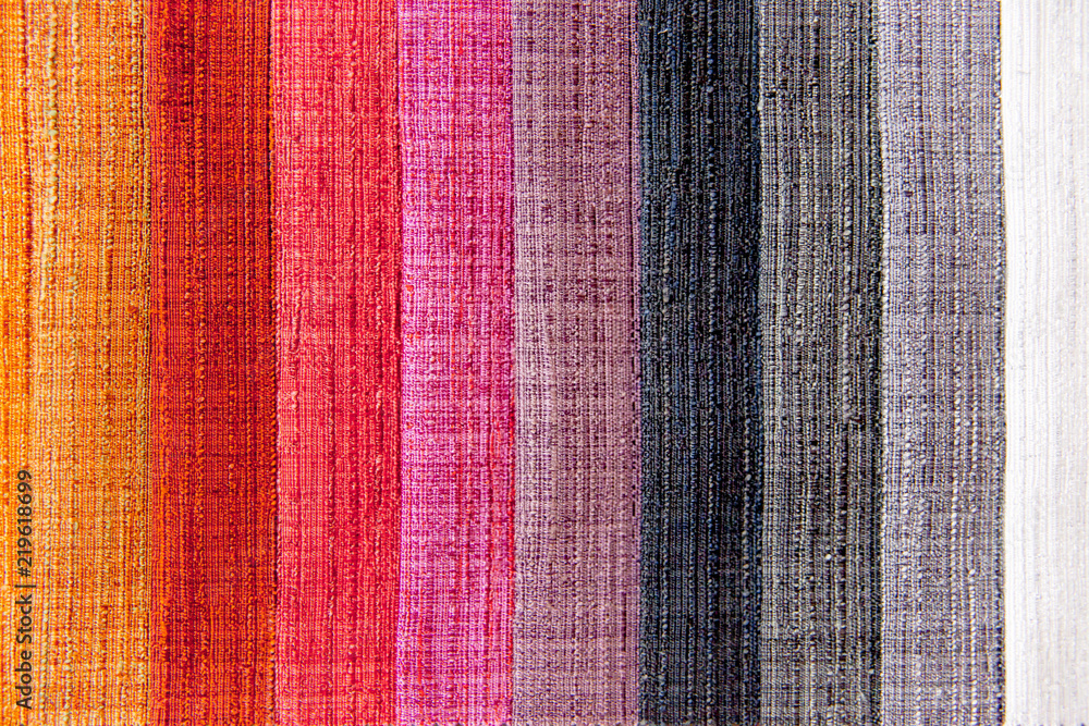 Rolls of fabric and textiles in a shop or store Rolls of fabric and textiles in a shop or store
