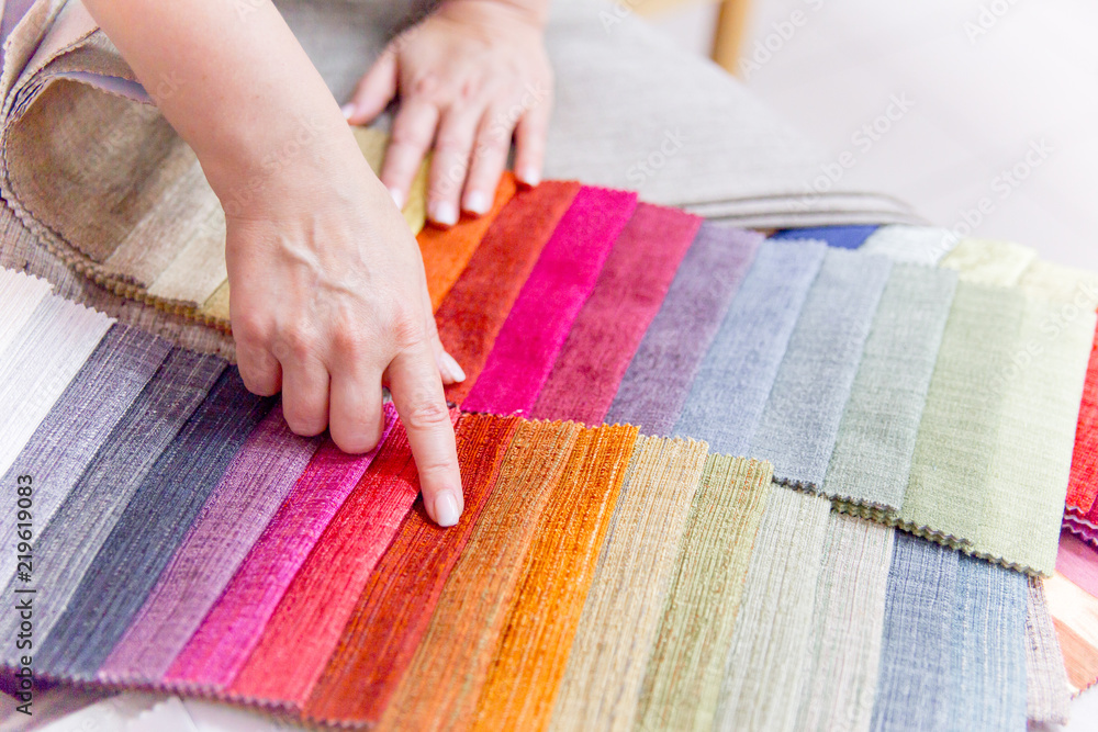Rolls of fabric and textiles in a shop or store Rolls of fabric and textiles in a shop or store