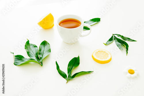 Cup of tea and mint on a dark background