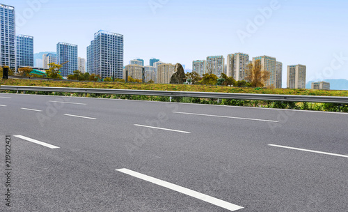 Modern city and asphalt highway