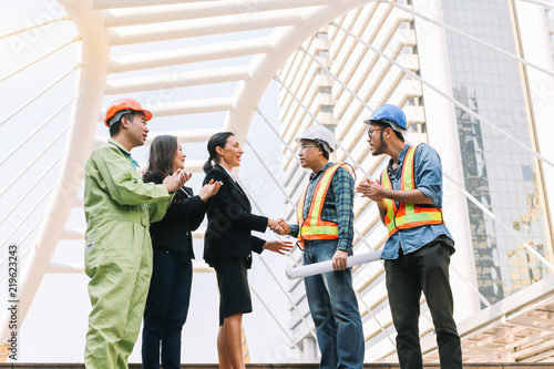 Engineers group and worker meeting handshake with business owners after receiving a great deal.